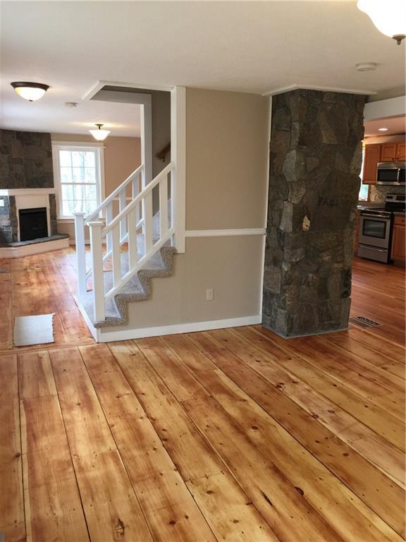 215 Beaver Dam Road North Waterboro, ME 04061 - Photo 12 of 26 Exposed stone chimney adds even more...