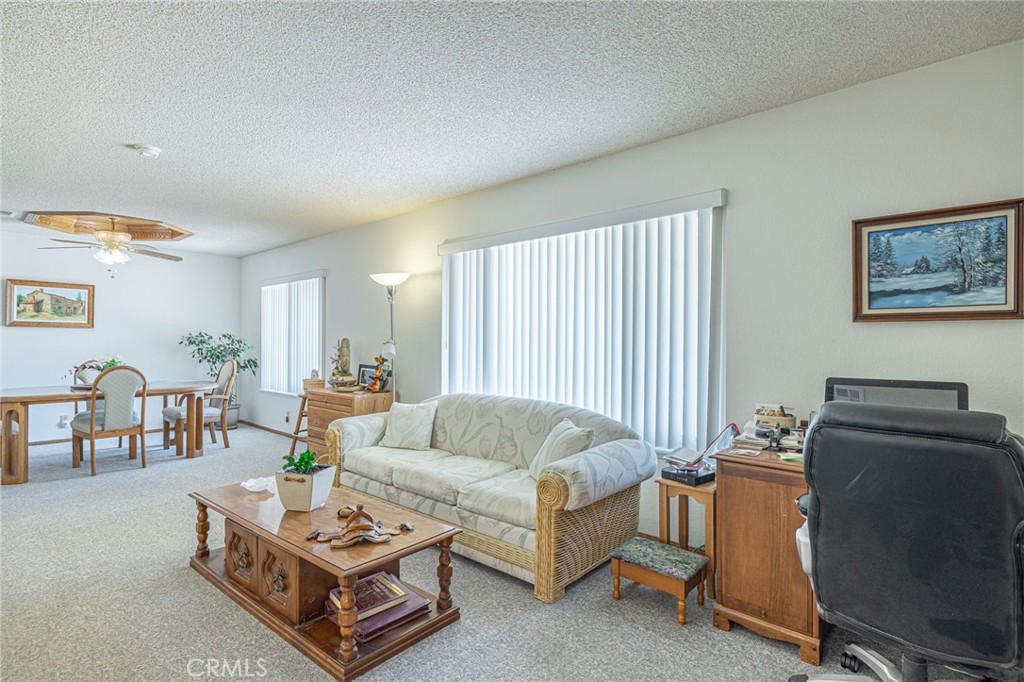 8541 West Ave D Lancaster, CA 93536 - Photo 12 of 62 a living room with furniture and a window