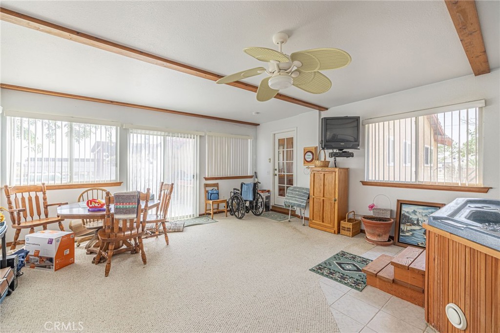 8541 West Ave D Lancaster, CA 93536 - Photo 28 of 62 a bedroom with furniture and a large window