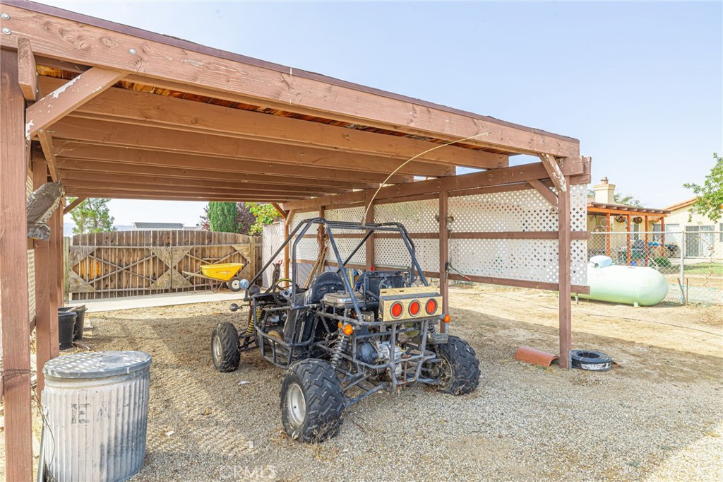 8541 West Ave D Lancaster, CA 93536 - Photo 41 of 62 a view of a chairs and table in the patio
