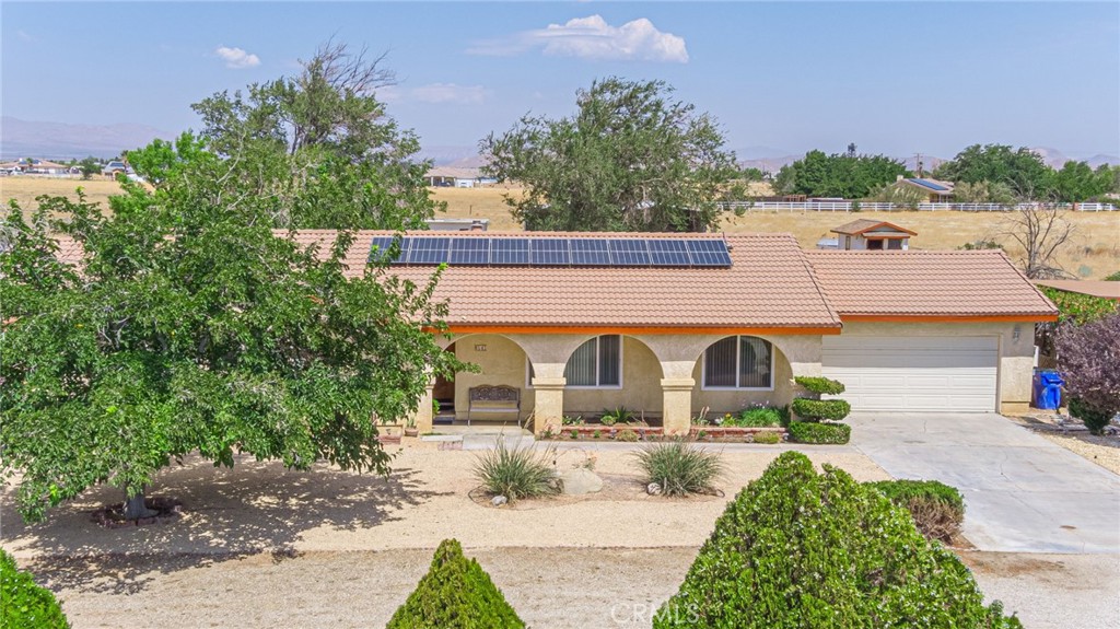 8541 West Ave D Lancaster, CA 93536 - Photo 46 of 62 a view of building with outdoor space