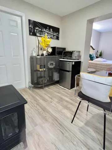 a kitchen with a sink appliances and cabinets