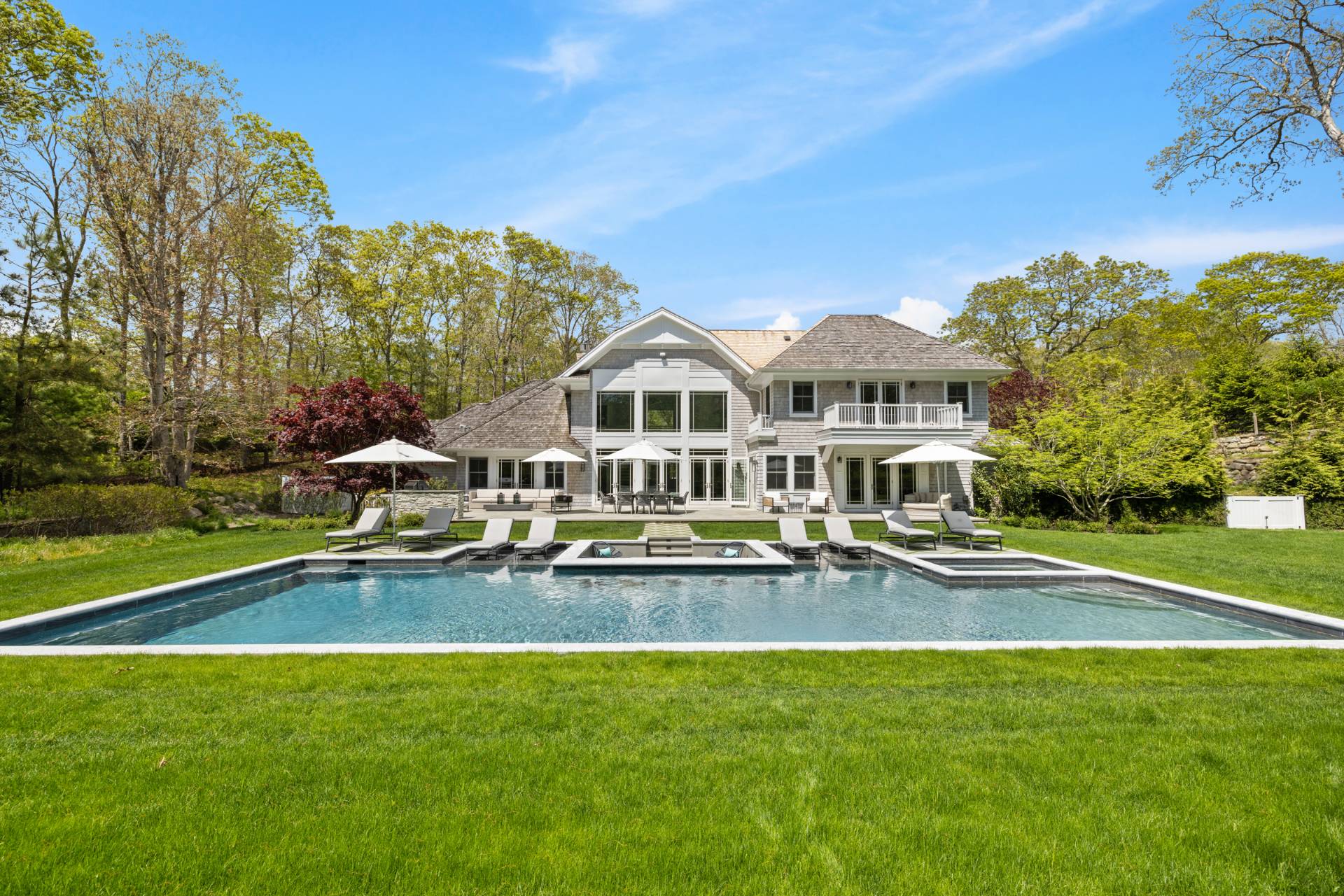 a view of a house with swimming pool