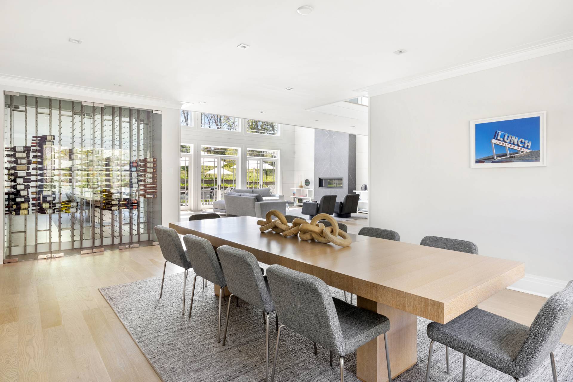 8 Shady Pth Bridgehampton, NY 11963 - Photo 12 of 45 a dining room with furniture and wooden floor