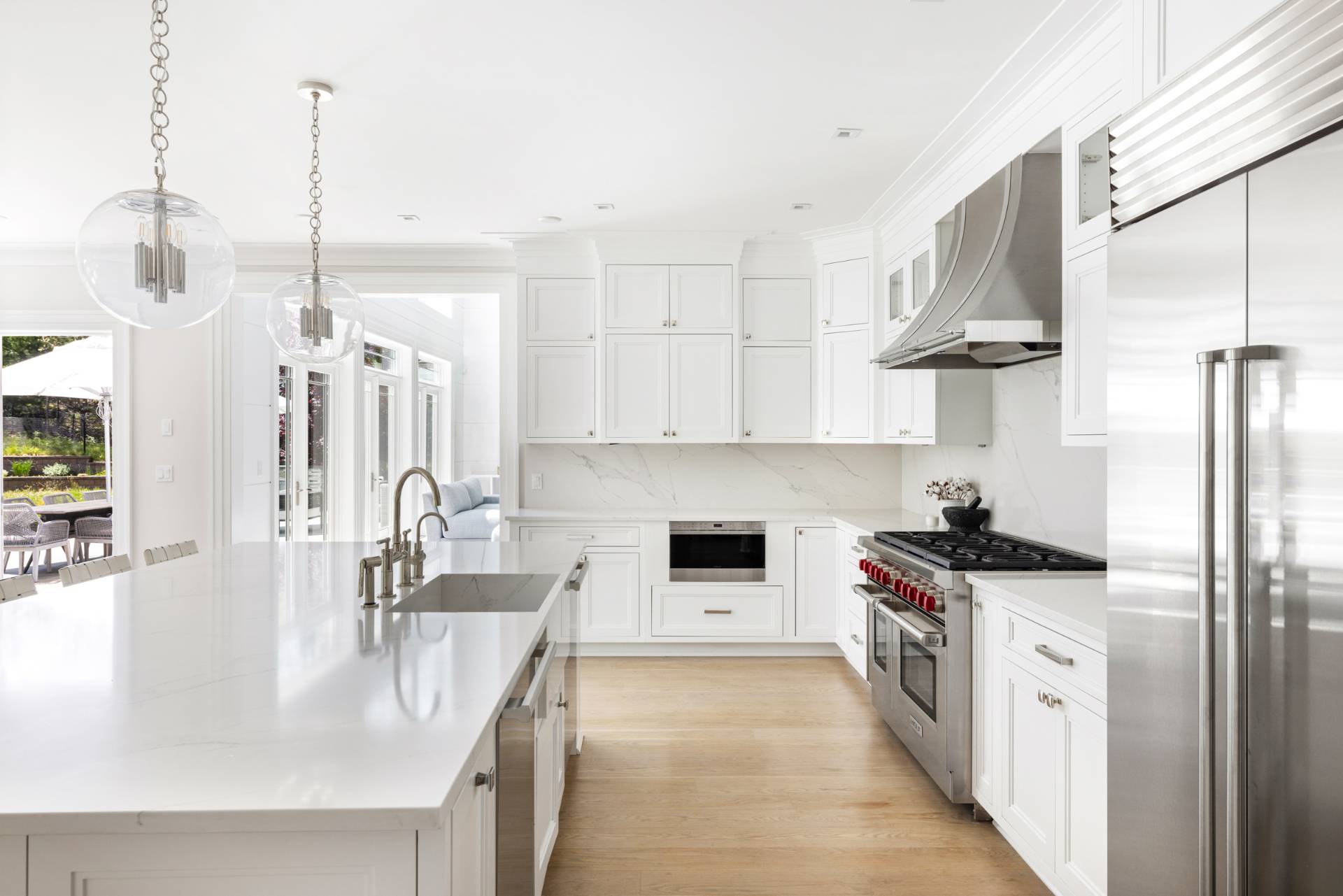 8 Shady Pth Bridgehampton, NY 11963 - Photo 14 of 45 a kitchen with stainless steel appliances kitchen island granite countertop a stove a sink and a refrigerator