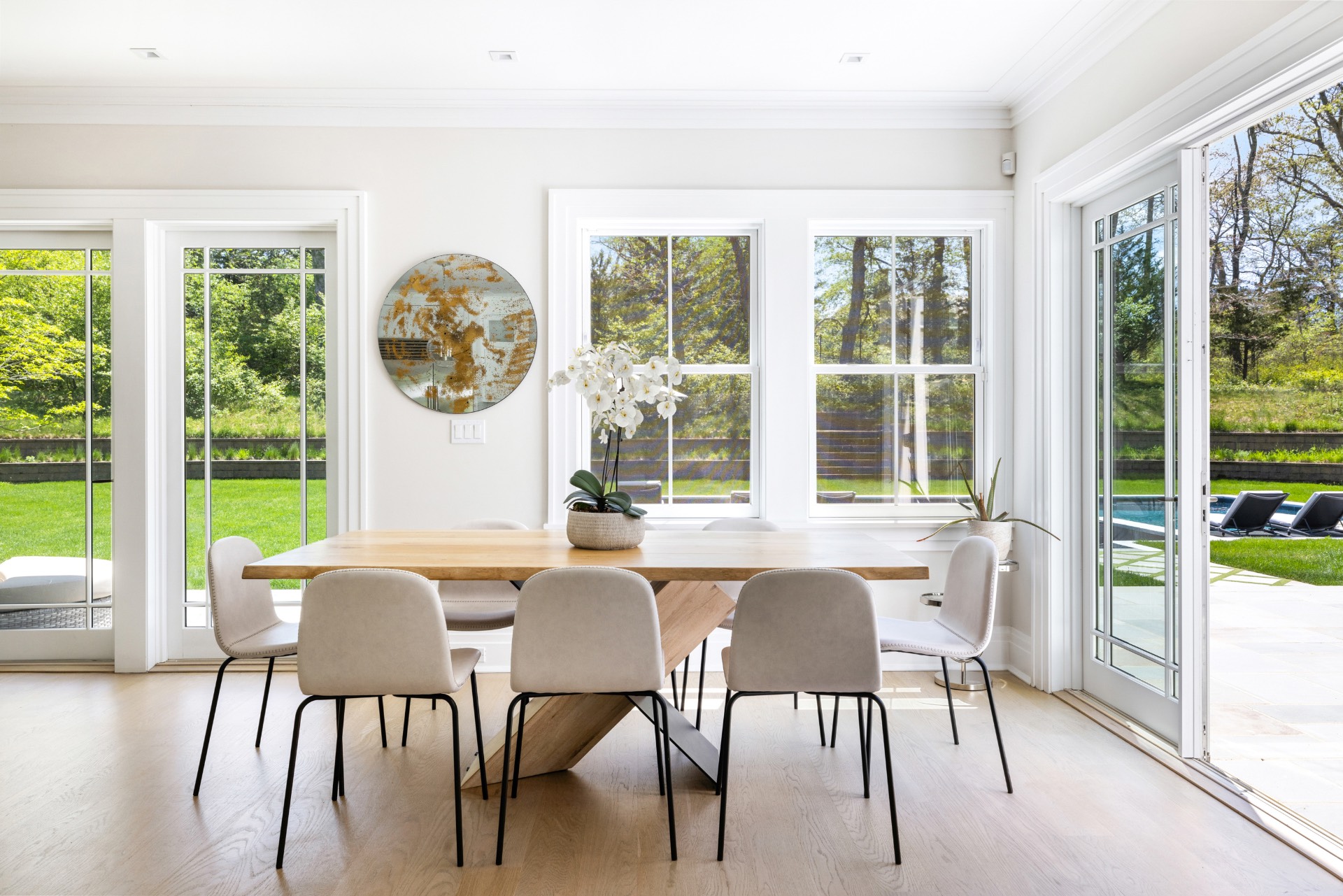 8 Shady Pth Bridgehampton, NY 11963 - Photo 15 of 45 a view of a dining room with furniture window and wooden floor