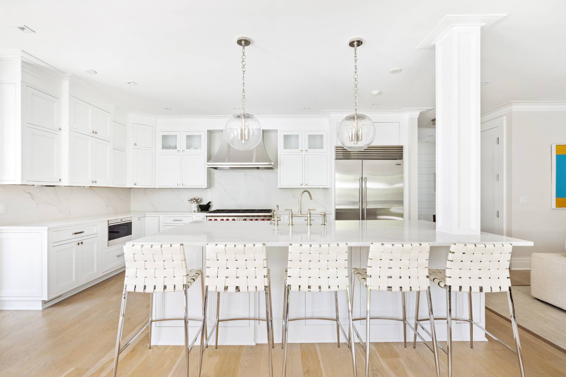 8 Shady Pth Bridgehampton, NY 11963 - Photo 18 of 45 a kitchen with stainless steel appliances kitchen island granite countertop a table and chairs in it
