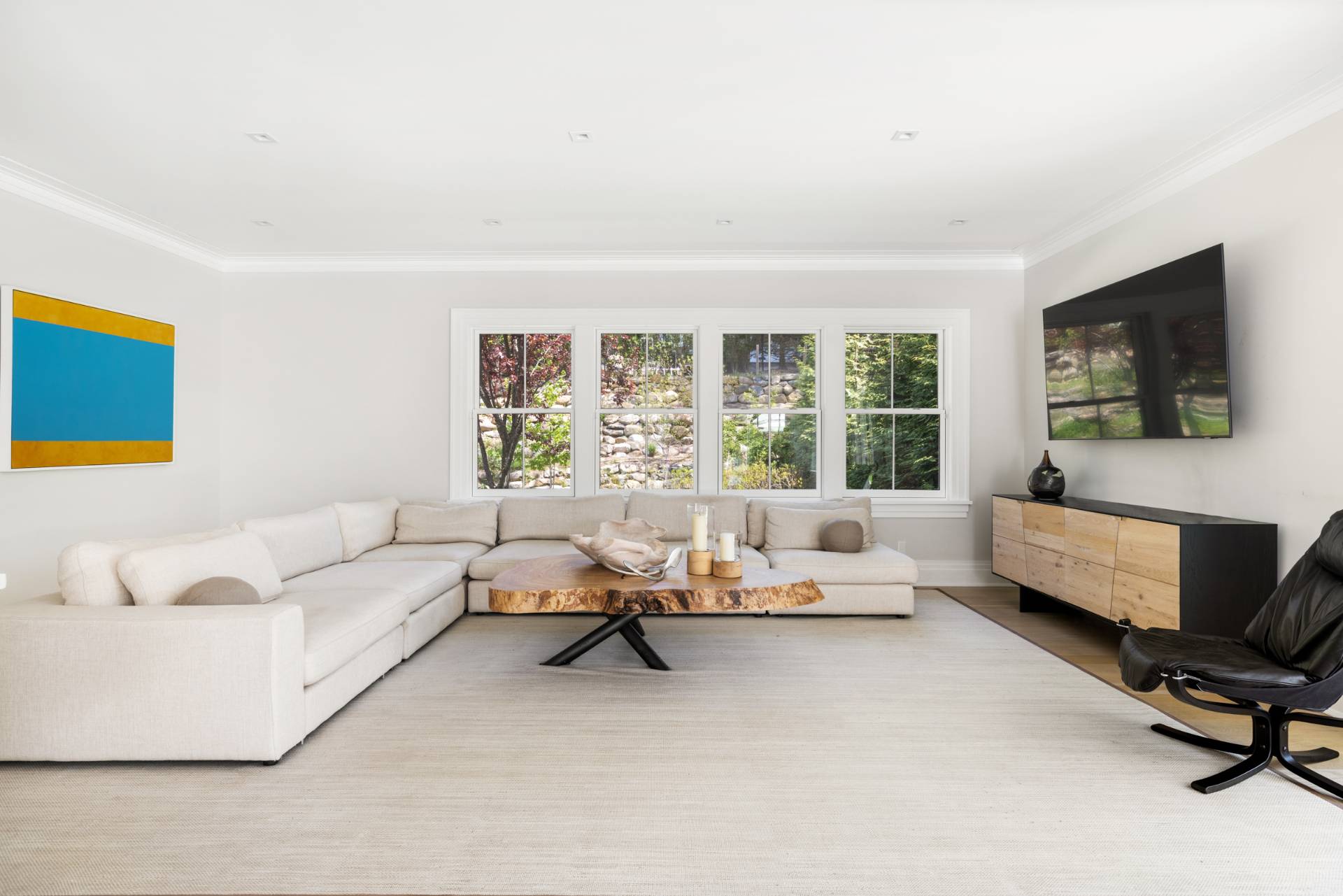 8 Shady Pth Bridgehampton, NY 11963 - Photo 19 of 45 a living room with furniture and a flat screen tv