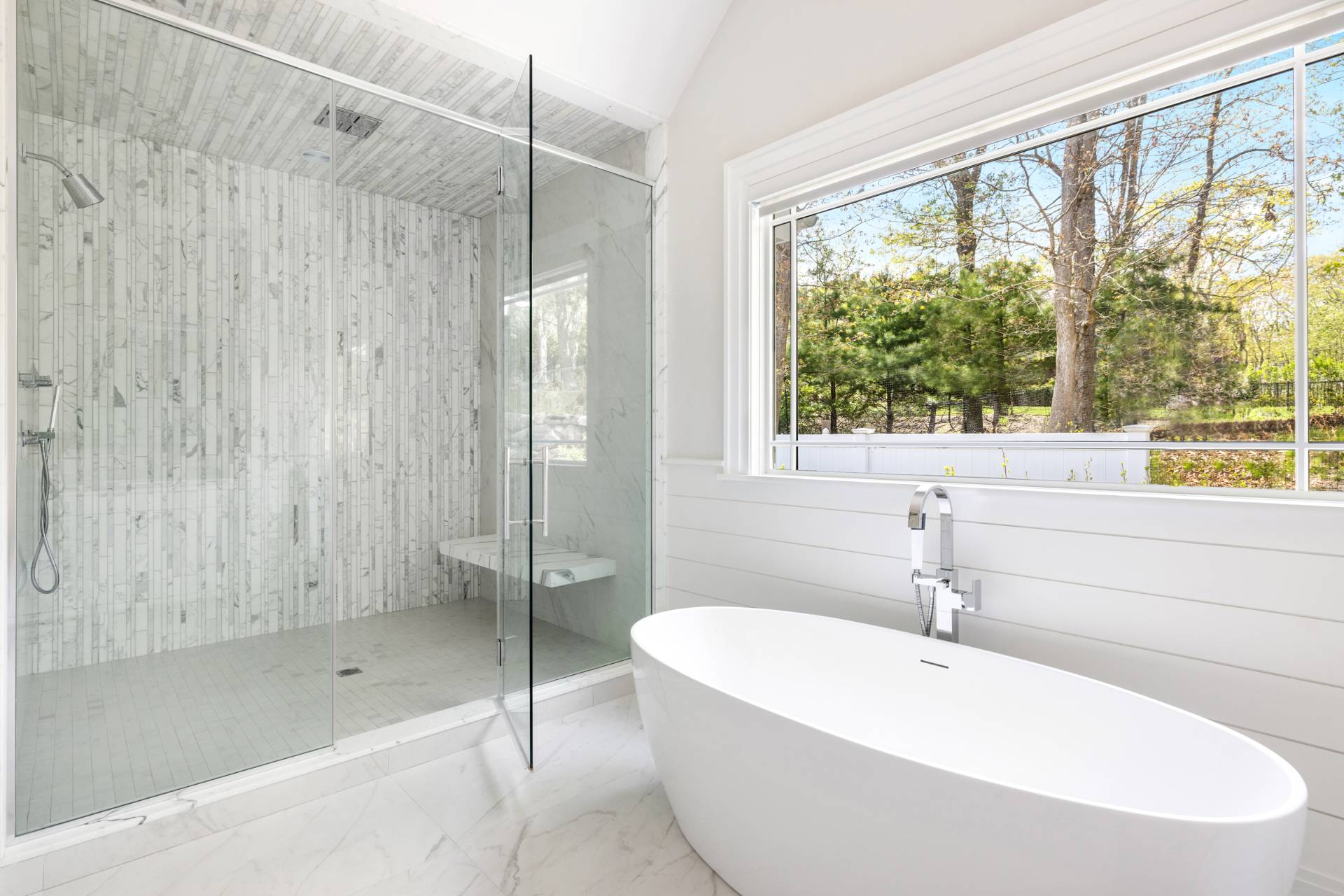 8 Shady Pth Bridgehampton, NY 11963 - Photo 23 of 45 a bathroom with a bathtub and shower
