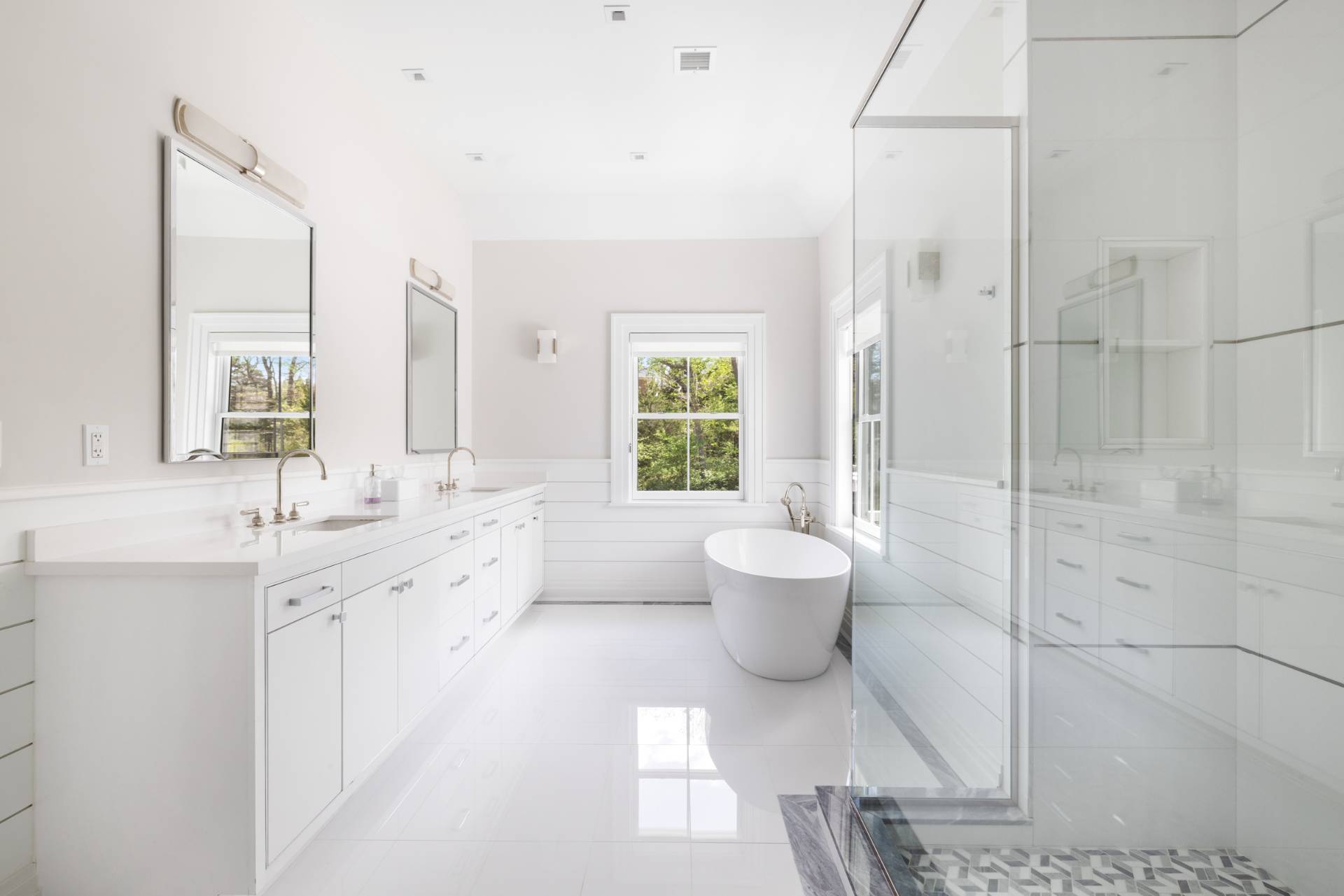 8 Shady Pth Bridgehampton, NY 11963 - Photo 32 of 45 a spacious bathroom with a double vanity sink toilet and shower