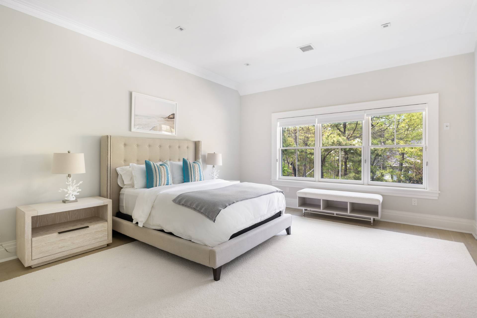 8 Shady Pth Bridgehampton, NY 11963 - Photo 35 of 45 a spacious bedroom with a bed and a window