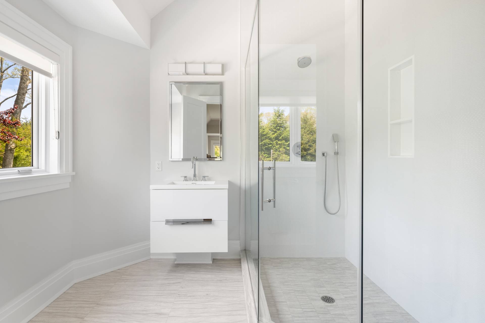 8 Shady Pth Bridgehampton, NY 11963 - Photo 36 of 45 a bathroom with a shower and a sink