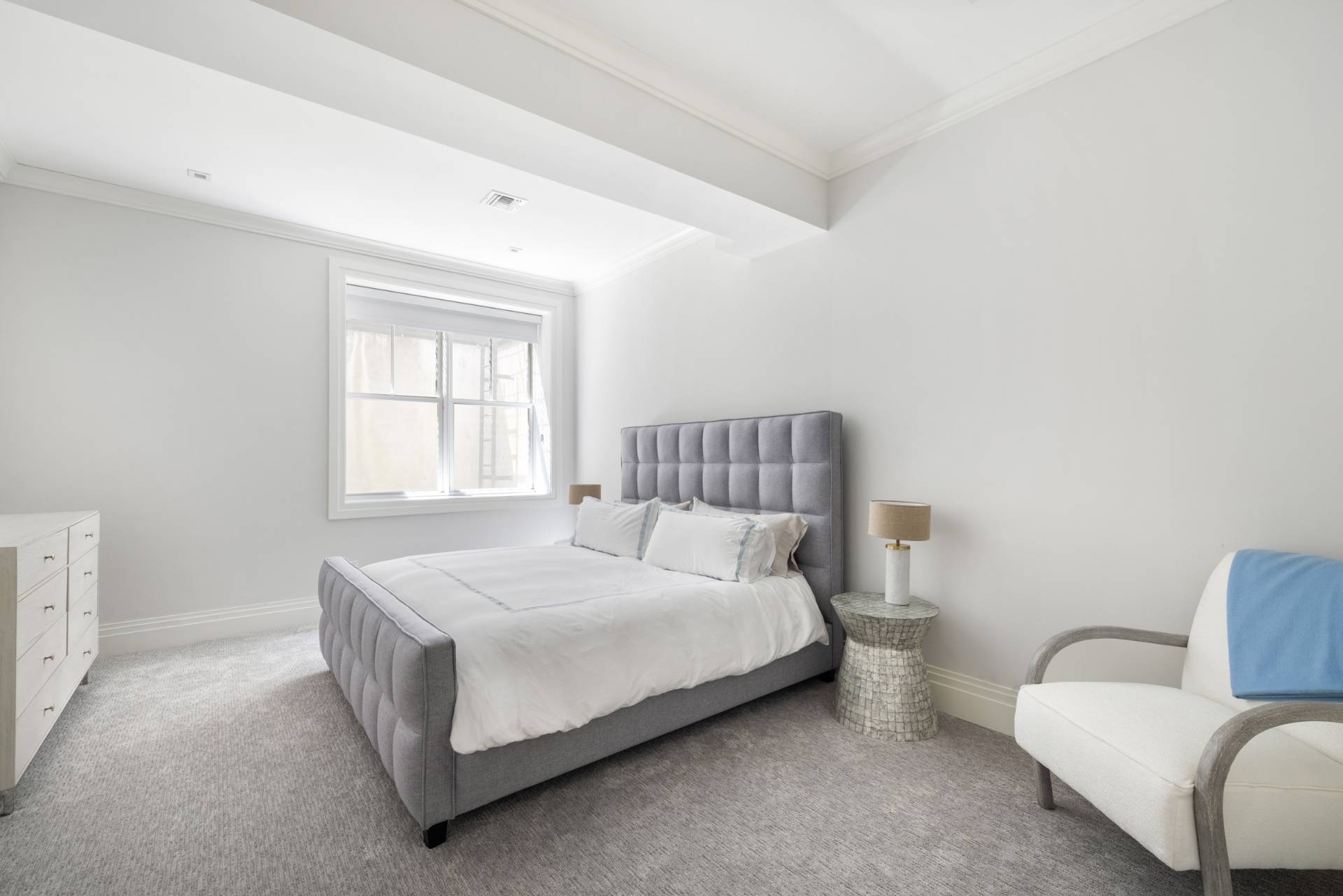 8 Shady Pth Bridgehampton, NY 11963 - Photo 39 of 45 a bedroom with a bed and a couch