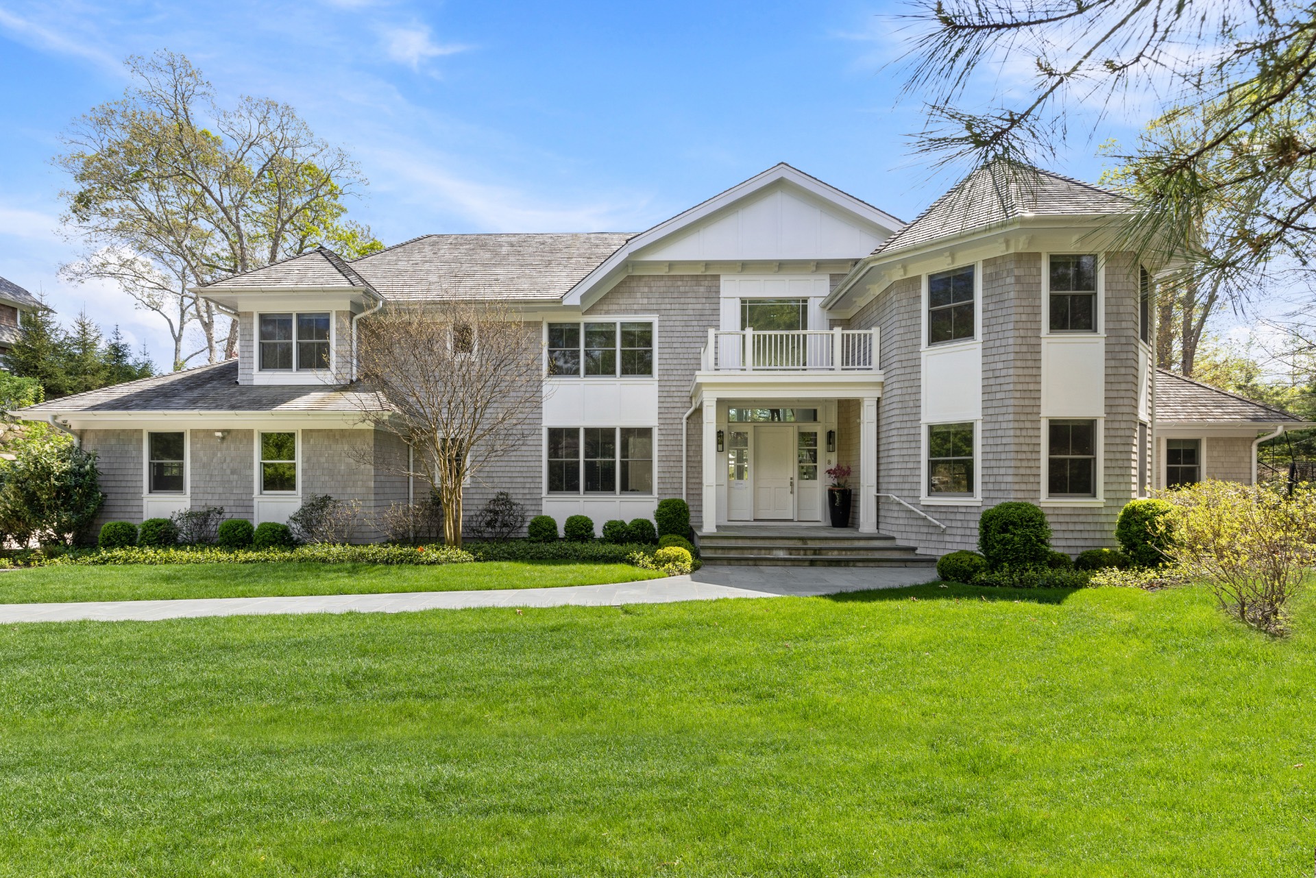 8 Shady Pth Bridgehampton, NY 11963 - Photo 44 of 45 a front view of a house with a yard