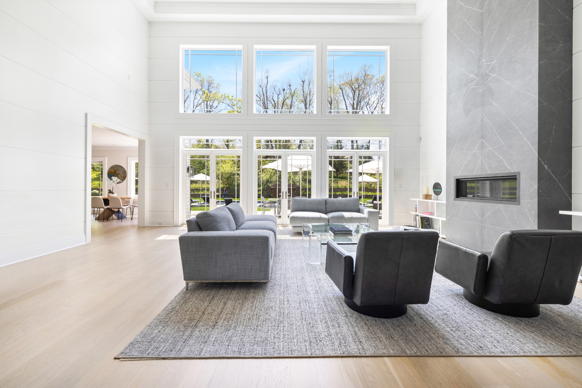 8 Shady Pth Bridgehampton, NY 11963 - Photo 7 of 45 a living room with furniture and a large window