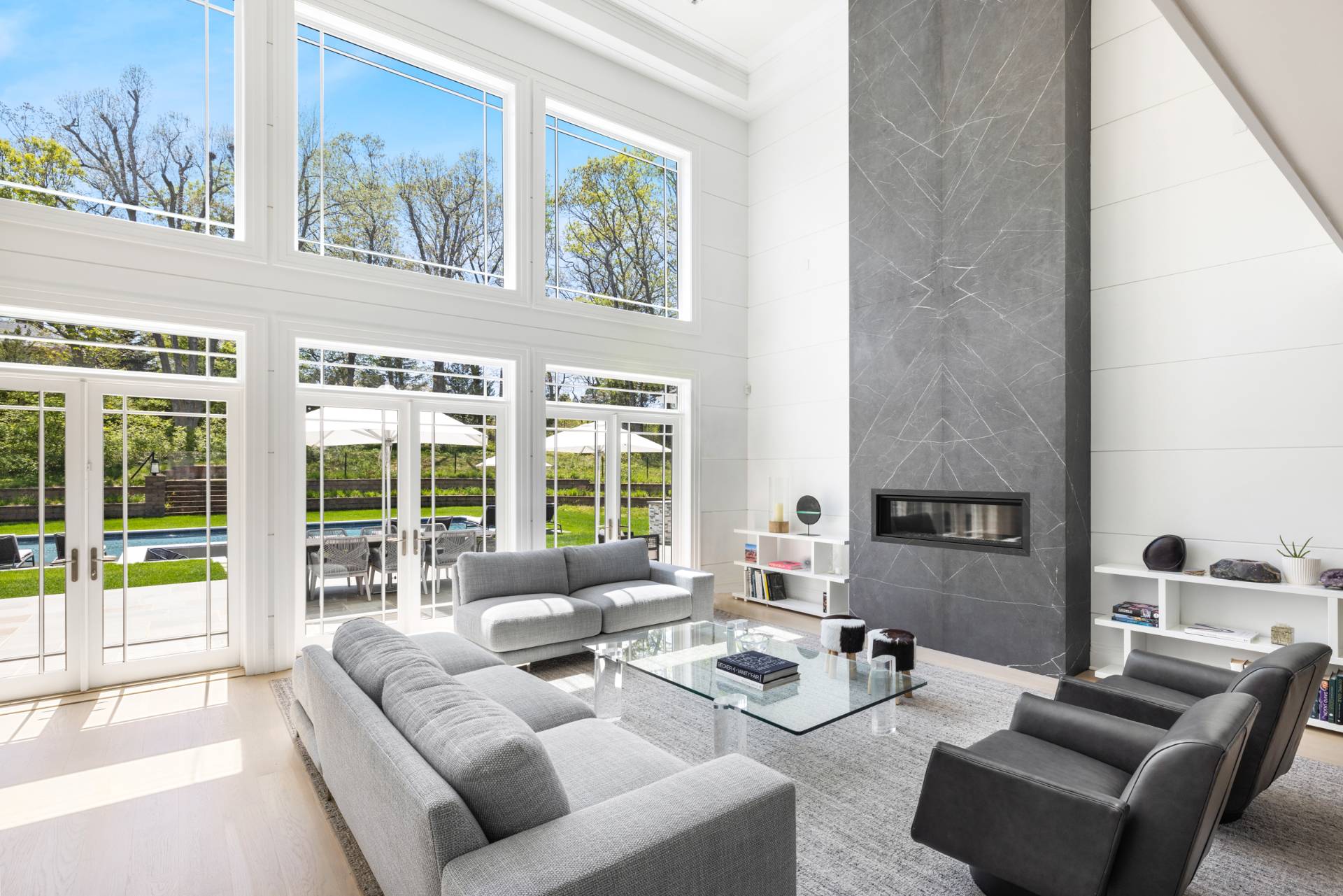 8 Shady Pth Bridgehampton, NY 11963 - Photo 8 of 45 a living room with furniture and a large window