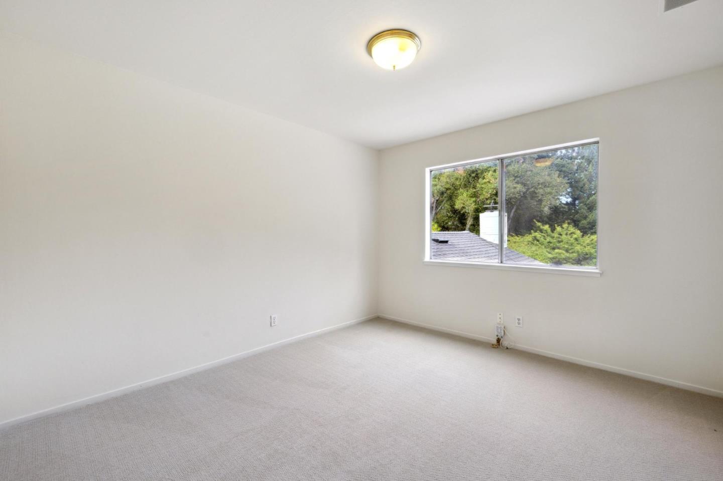 243 Selby Lane Atherton, CA 94027 - Photo 44 of 90 an empty room with a window