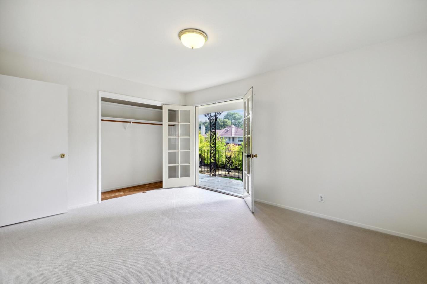 243 Selby Lane Atherton, CA 94027 - Photo 49 of 90 a view of a room with an empty space and a window