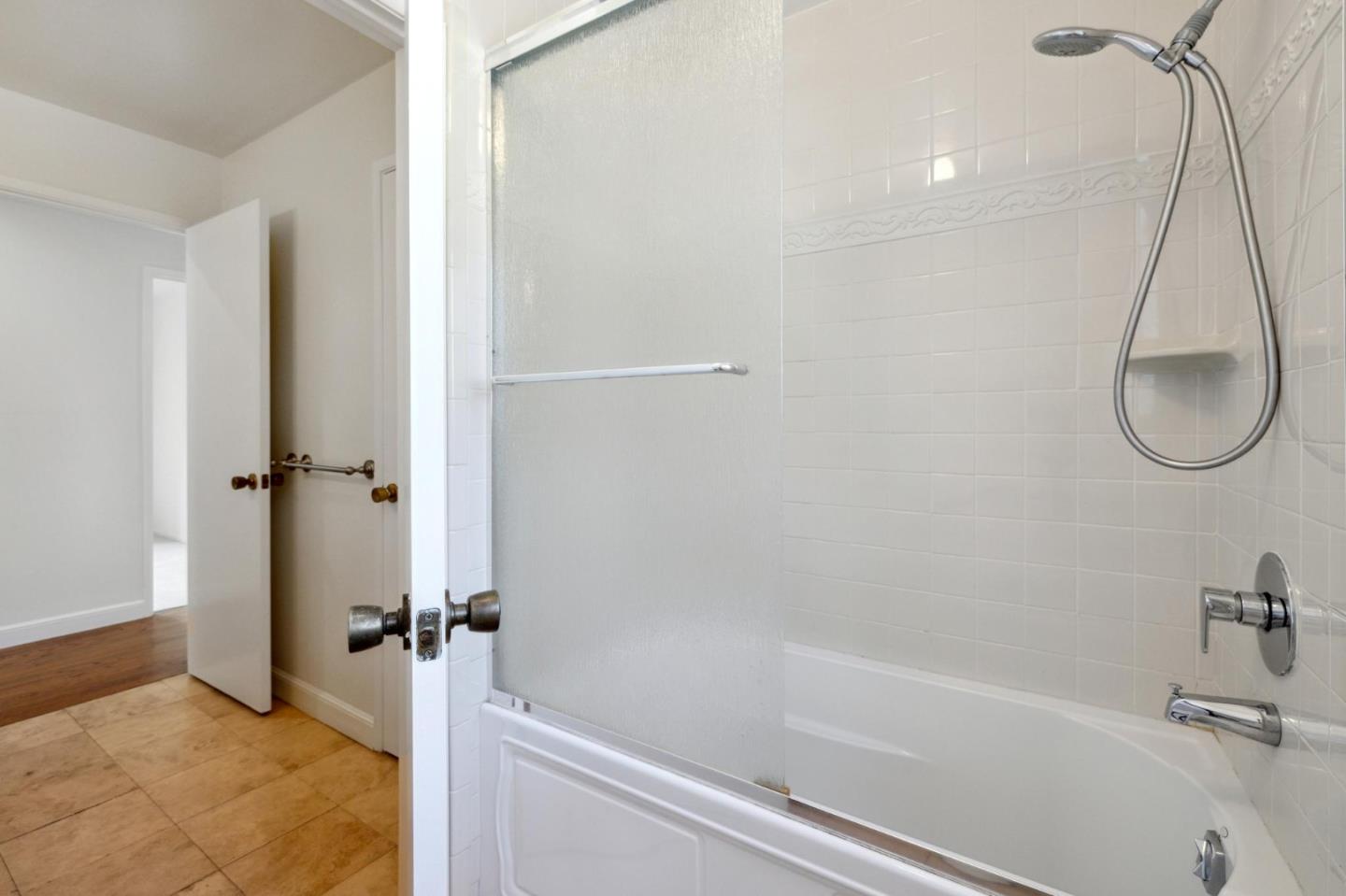 243 Selby Lane Atherton, CA 94027 - Photo 53 of 90 a bathroom with a bath tub and a shower