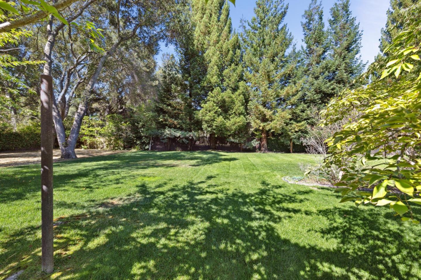 243 Selby Lane Atherton, CA 94027 - Photo 71 of 90 a view of outdoor space with deck and yard