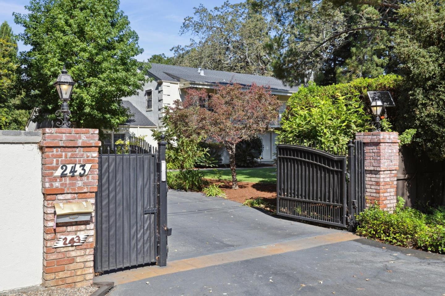 243 Selby Lane Atherton, CA 94027 - Photo 84 of 90 a view of a street with wooden fence