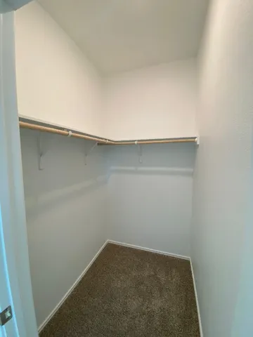 an empty room with a bench