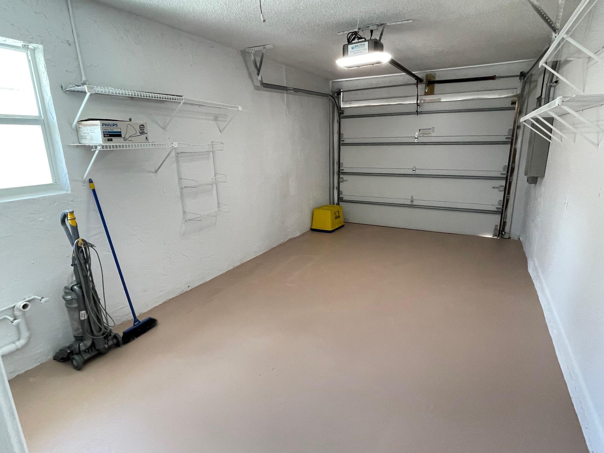 9151 Pine Springs Drive Boca Raton, FL 33428 - Photo 17 of 21 a view of a room with gym equipment