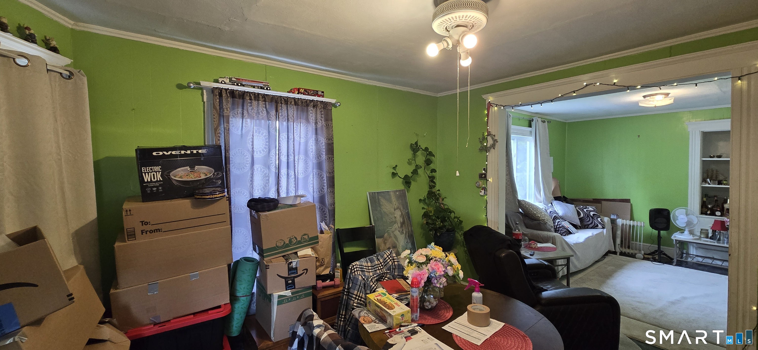 25 High Street Torrington, CT 06790 - Photo 13 of 16 a living room with furniture and a window