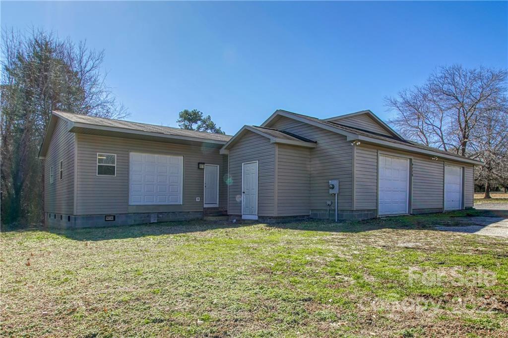 4106 Puetts Chapel Road Dallas, NC 28034 - Photo 17 of 23 a view of a house with yard and fence