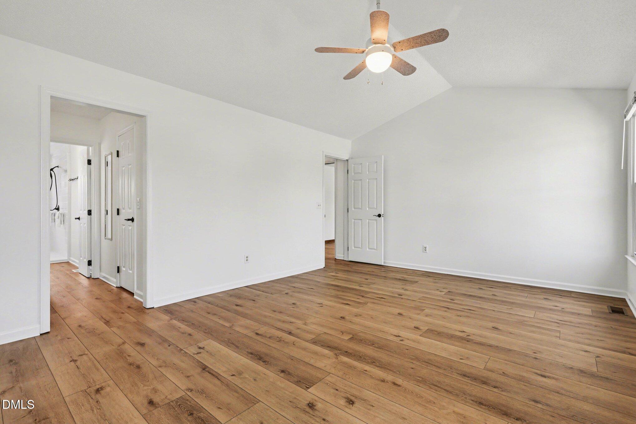 2004 Little Pond Place Willow Spring, NC 27592 - Photo 12 of 32 wooden floor in an empty room