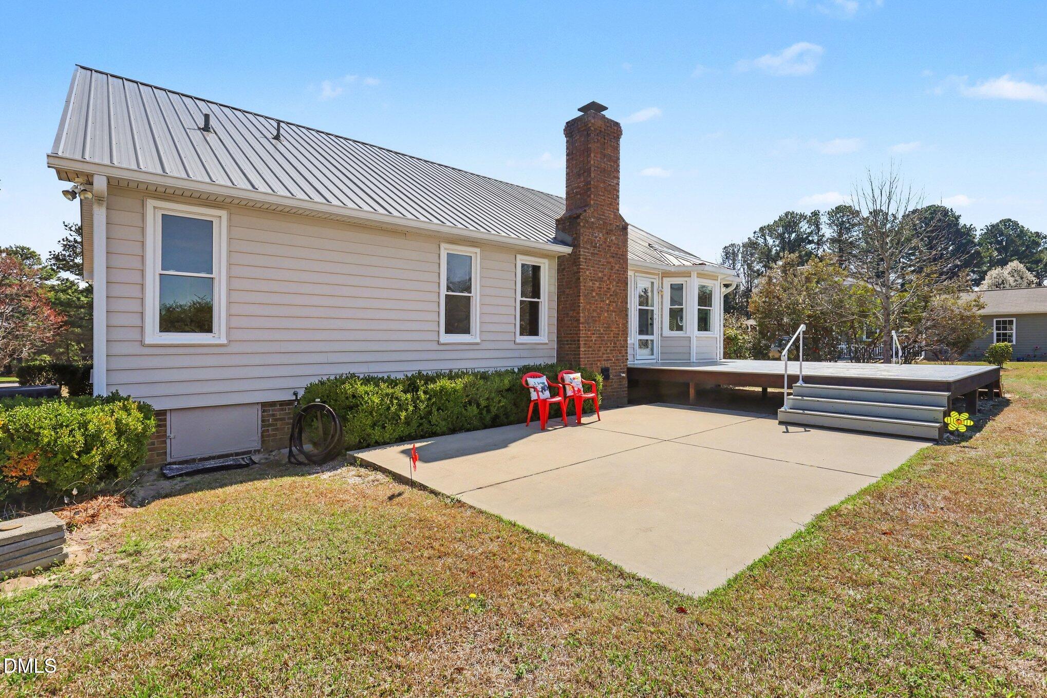 2004 Little Pond Place Willow Spring, NC 27592 - Photo 19 of 32 a house view with a garden space
