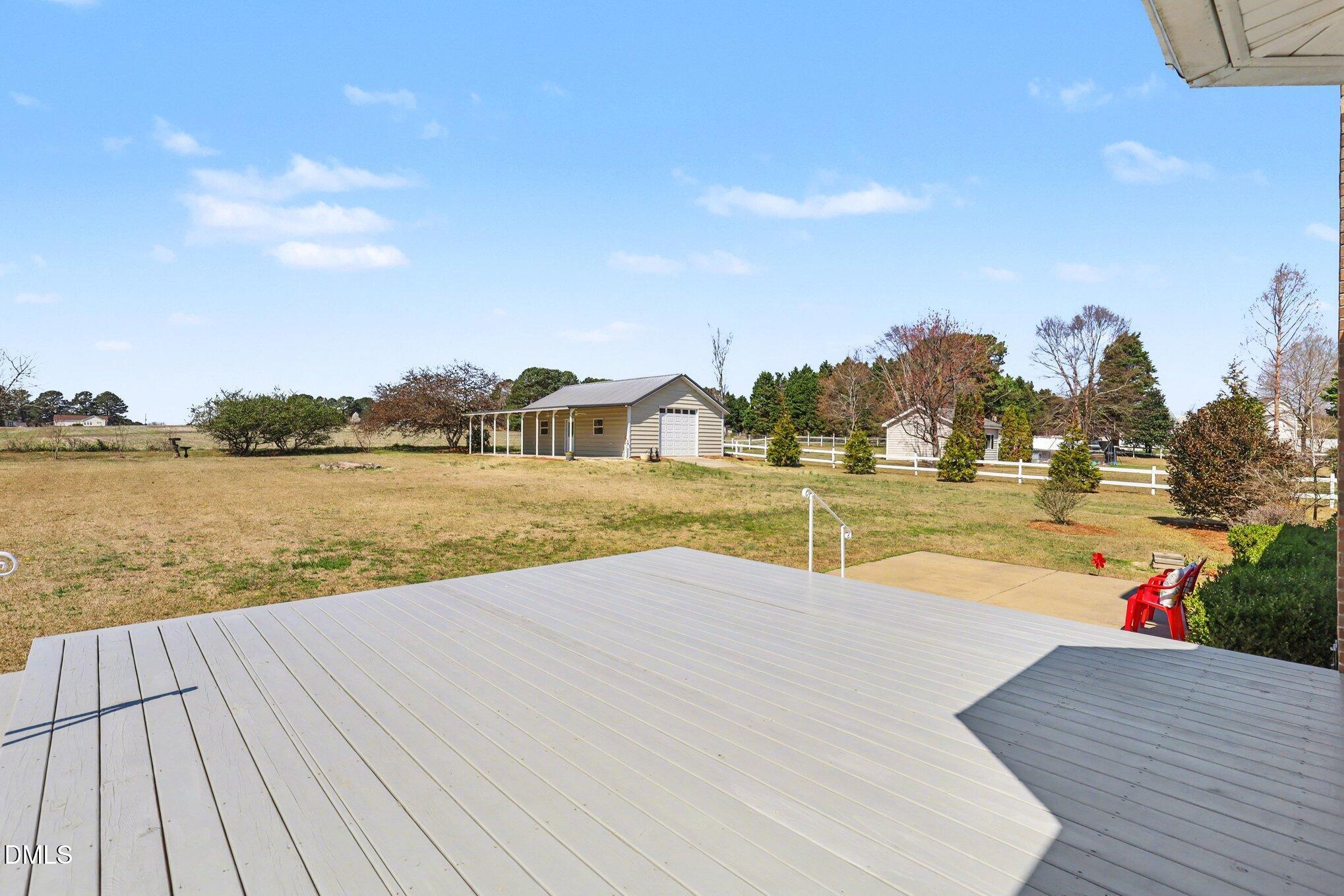 2004 Little Pond Place Willow Spring, NC 27592 - Photo 20 of 32 a view of lake and houses with outdoor space