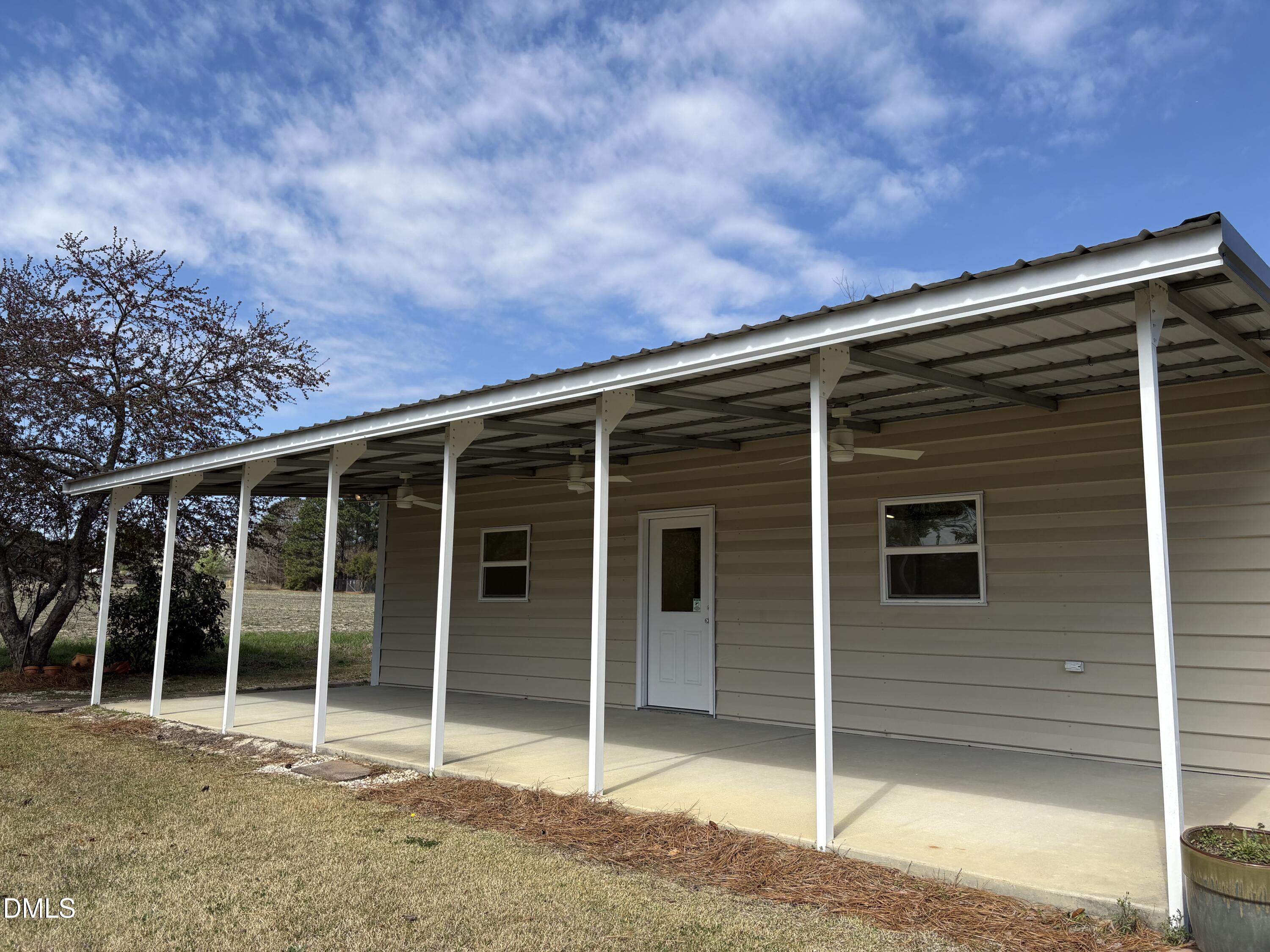 2004 Little Pond Place Willow Spring, NC 27592 - Photo 23 of 32 a backyard of a house with plants