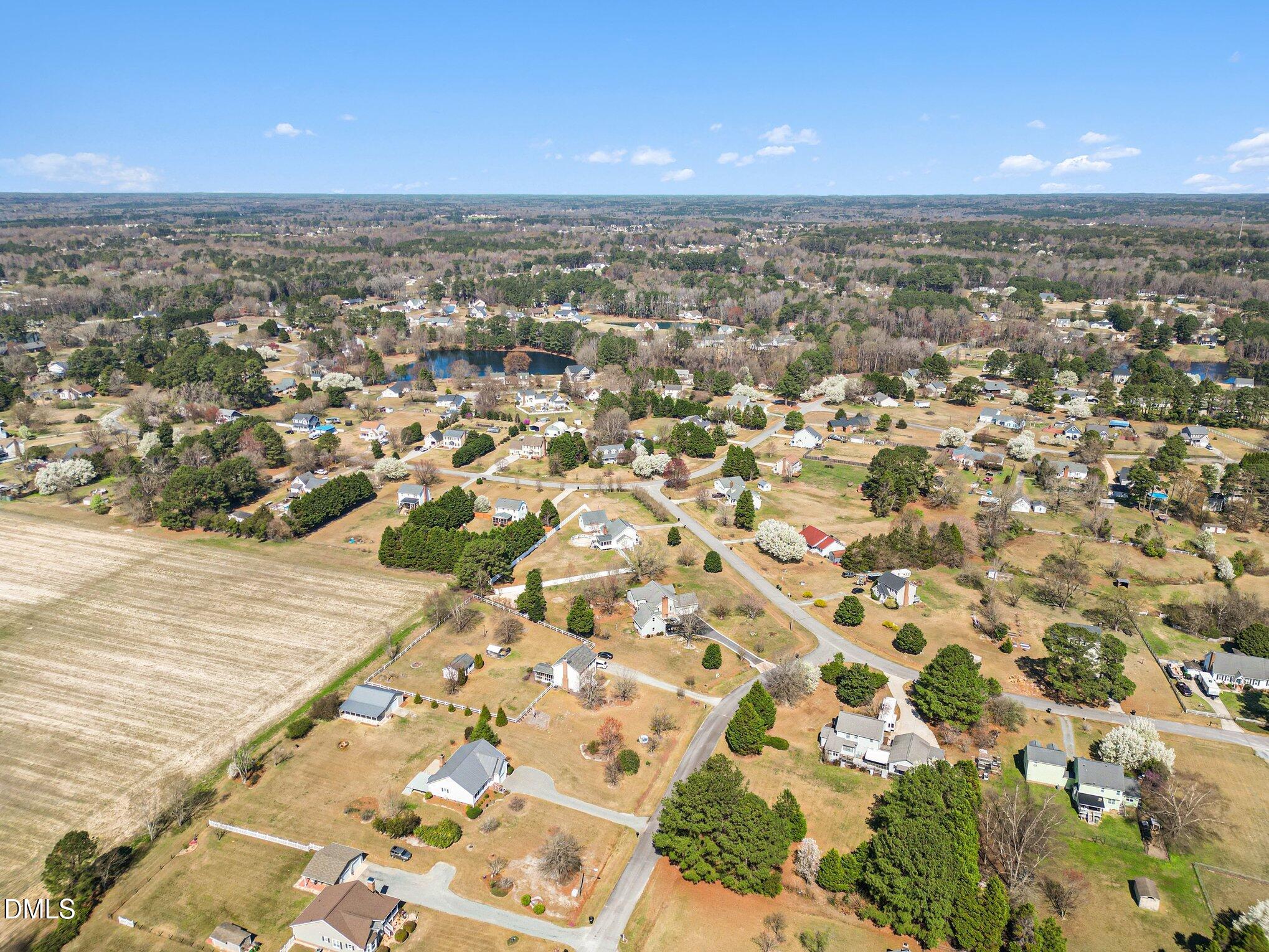 2004 Little Pond Place Willow Spring, NC 27592 - Photo 27 of 32 an aerial view of residential houses with outdoor space