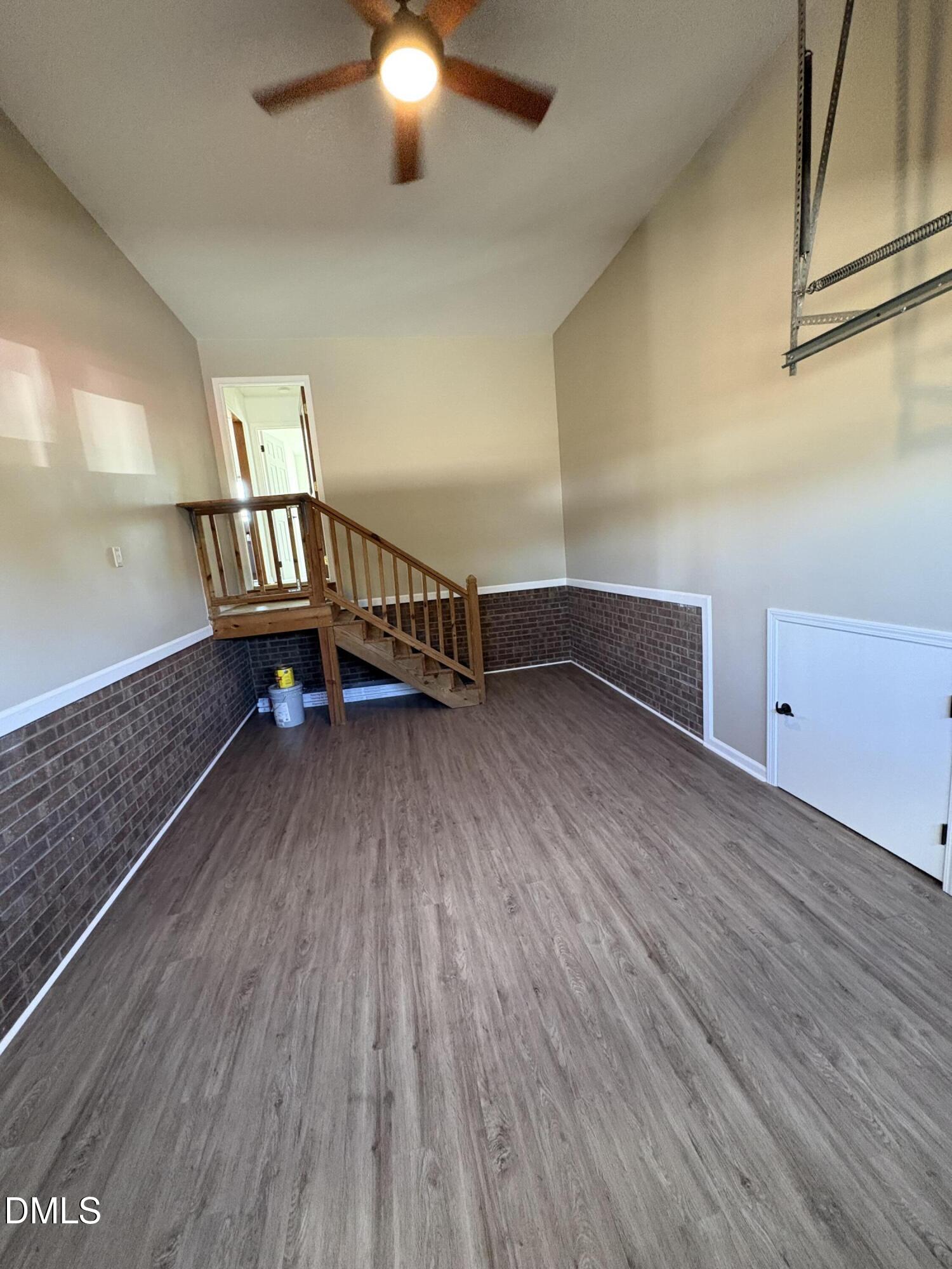 2004 Little Pond Place Willow Spring, NC 27592 - Photo 30 of 32 a view of an empty room with wooden floor