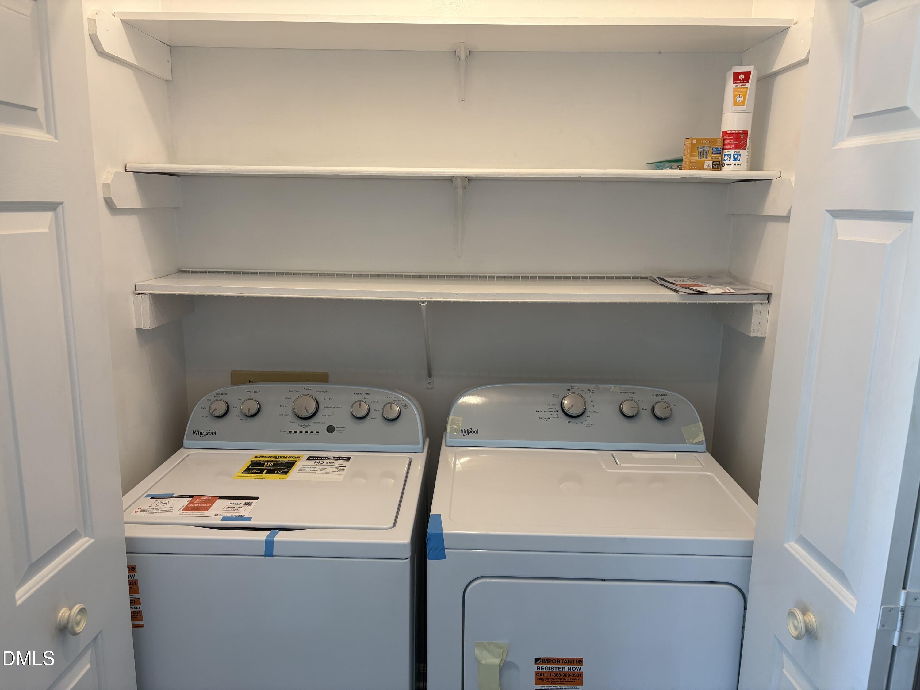 2004 Little Pond Place Willow Spring, NC 27592 - Photo 10 of 32 a utility room with dryer and washer
