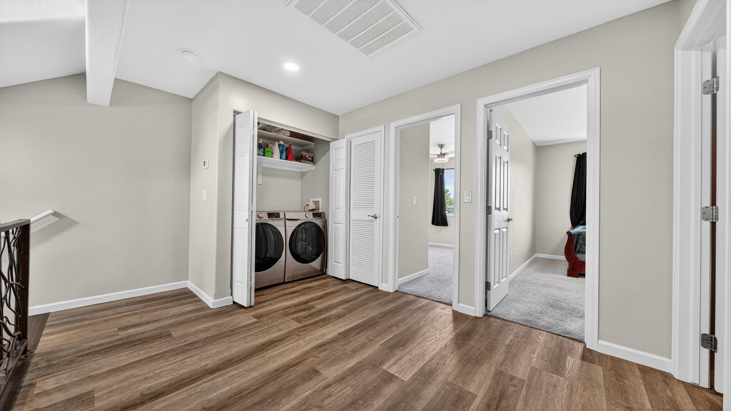 475 David Court Fruita, CO 81521 - Photo 13 of 29 a view of a hallway with wooden flooring