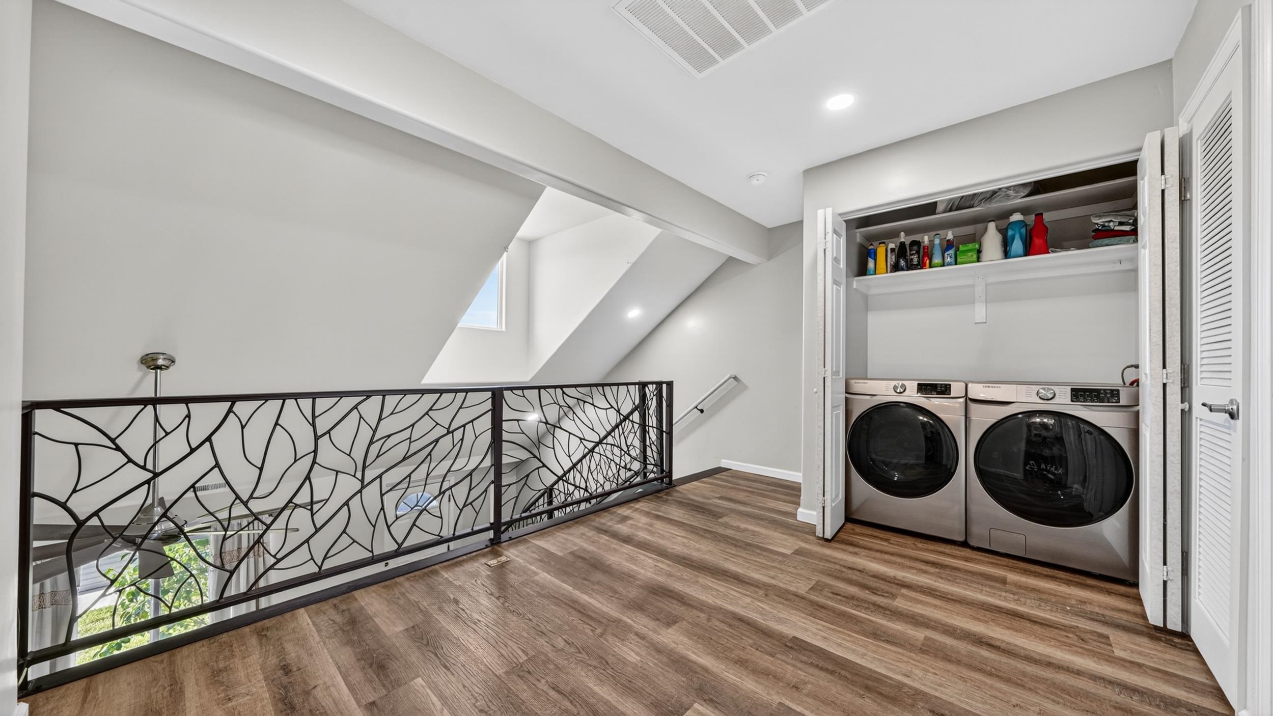 475 David Court Fruita, CO 81521 - Photo 14 of 29 a view of a hallway with washer and dryer