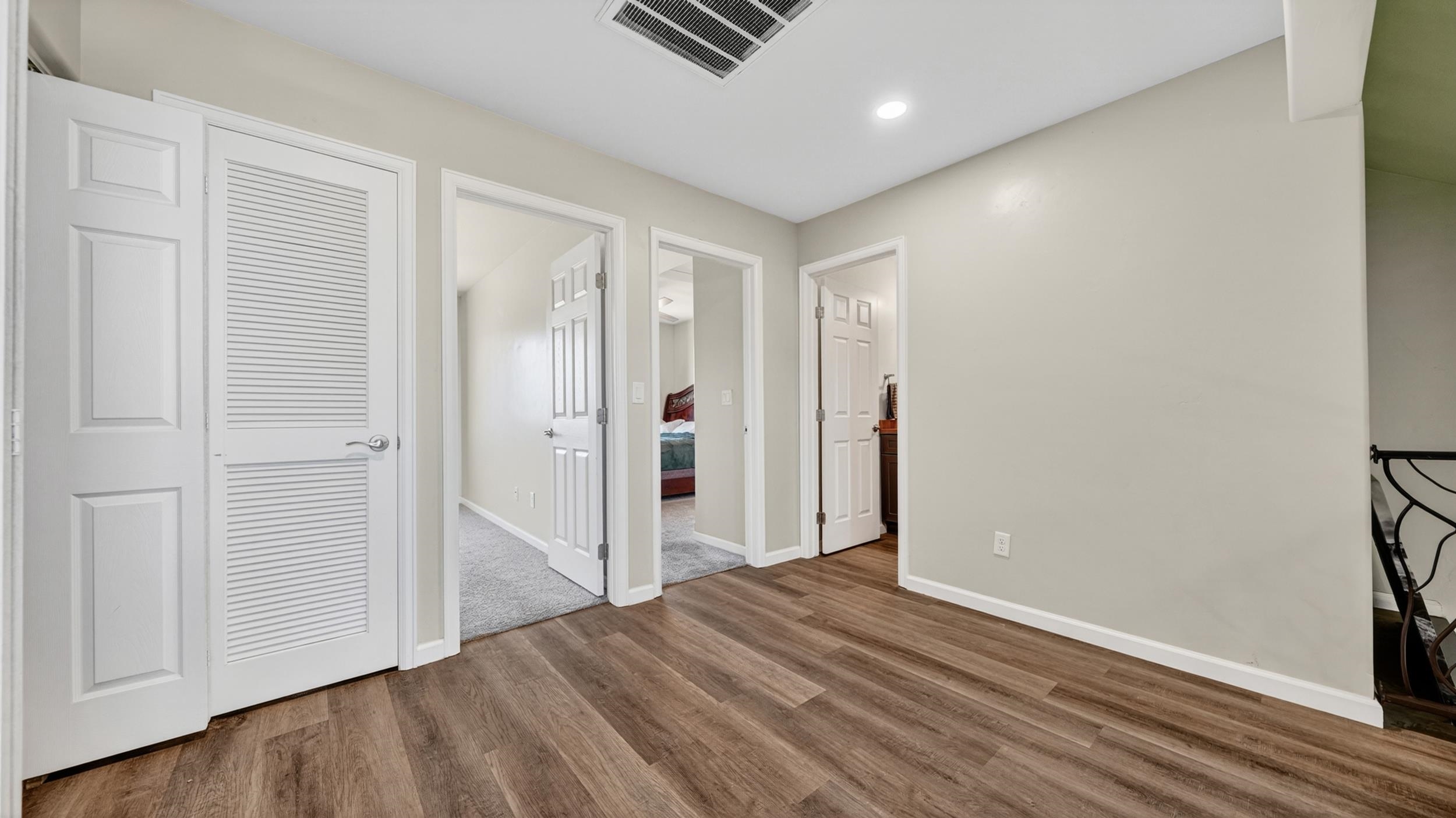 475 David Court Fruita, CO 81521 - Photo 15 of 29 a view of hallway with wooden floor