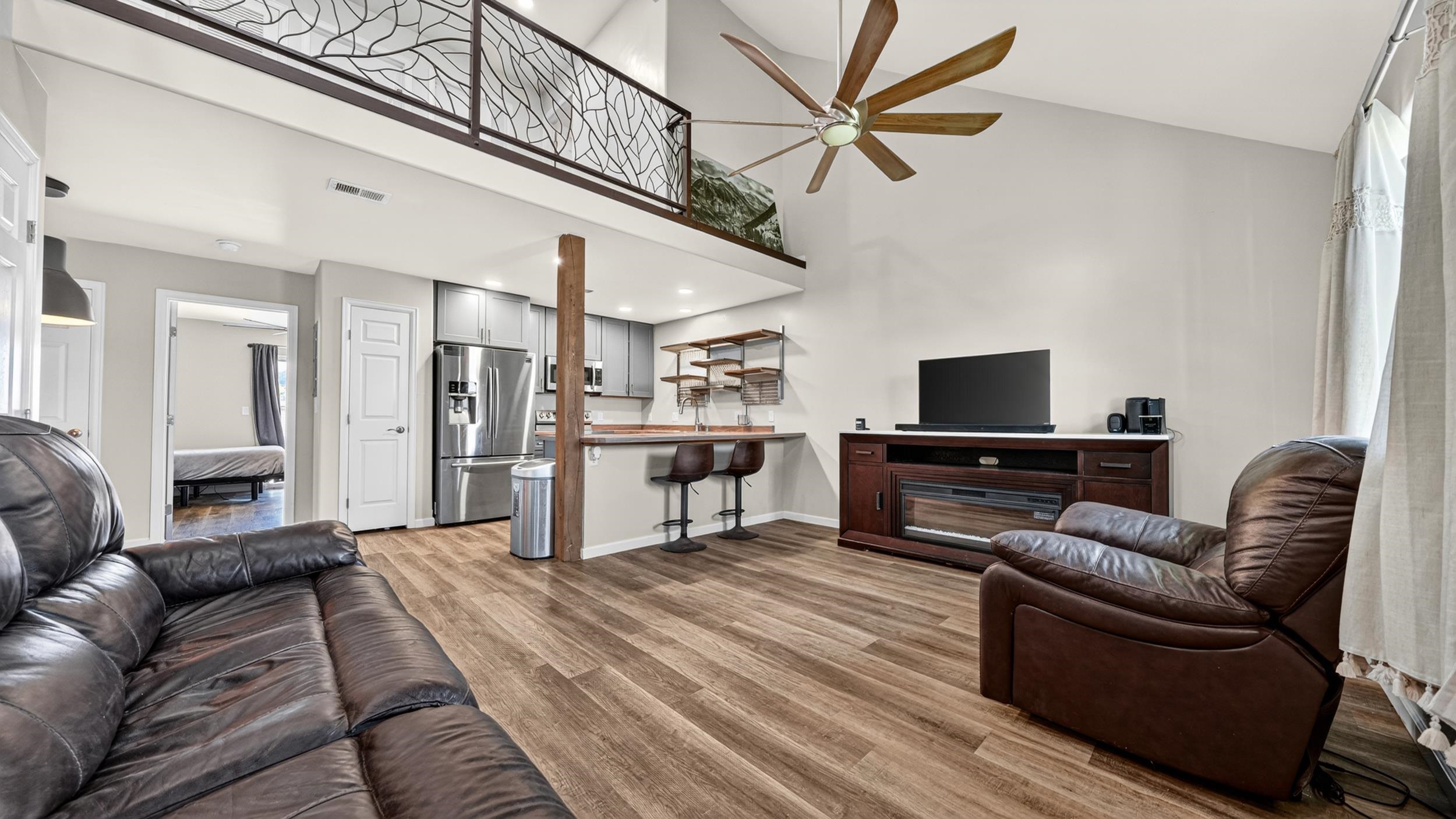 475 David Court Fruita, CO 81521 - Photo 2 of 29 a living room with furniture and a flat screen tv
