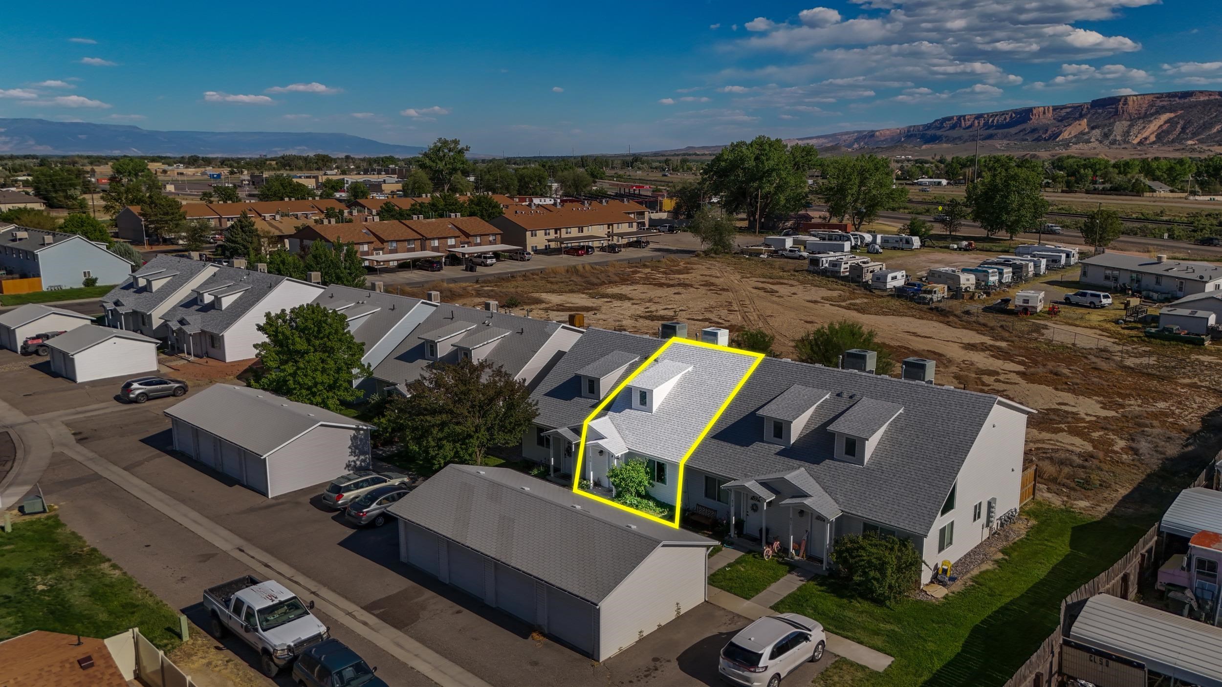 475 David Court Fruita, CO 81521 - Photo 24 of 29 an aerial view of a house with a garden