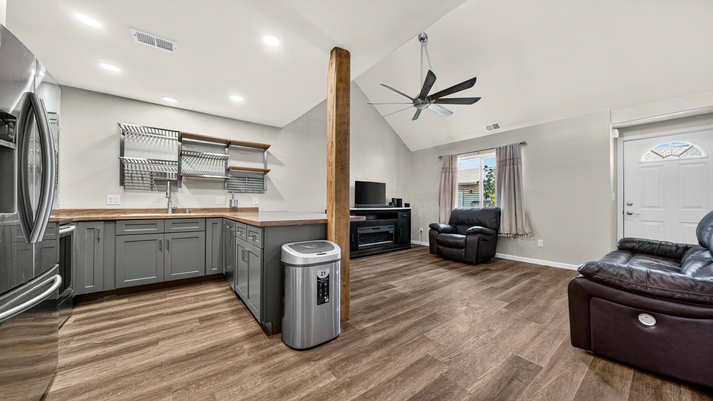 475 David Court Fruita, CO 81521 - Photo 6 of 29 a kitchen with sink cabinets and wooden floor