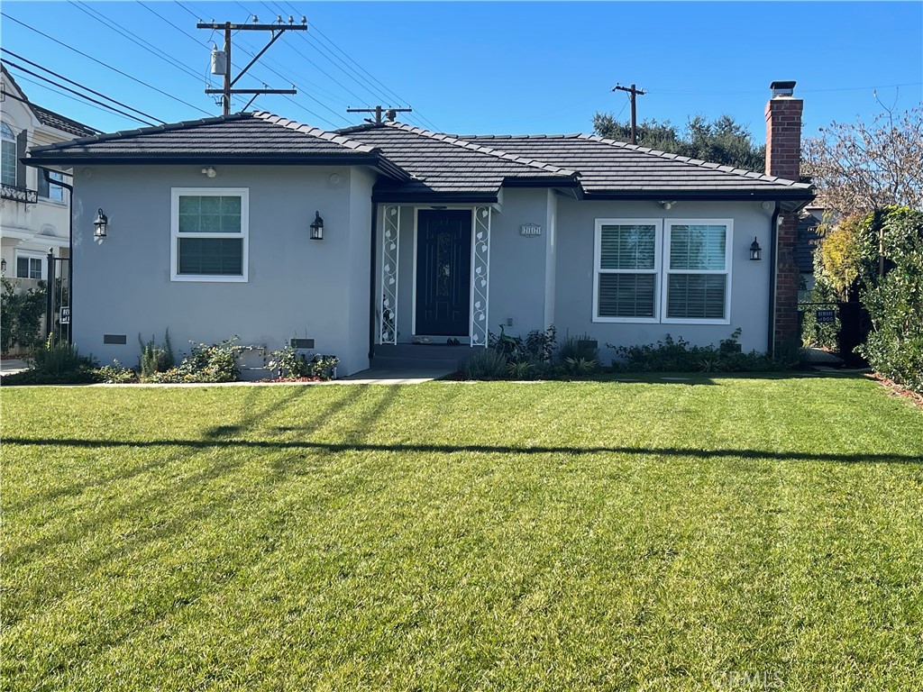 717 Joaquin Road Arcadia, CA 91007 - Photo 1 of 1 a front view of a house with a yard