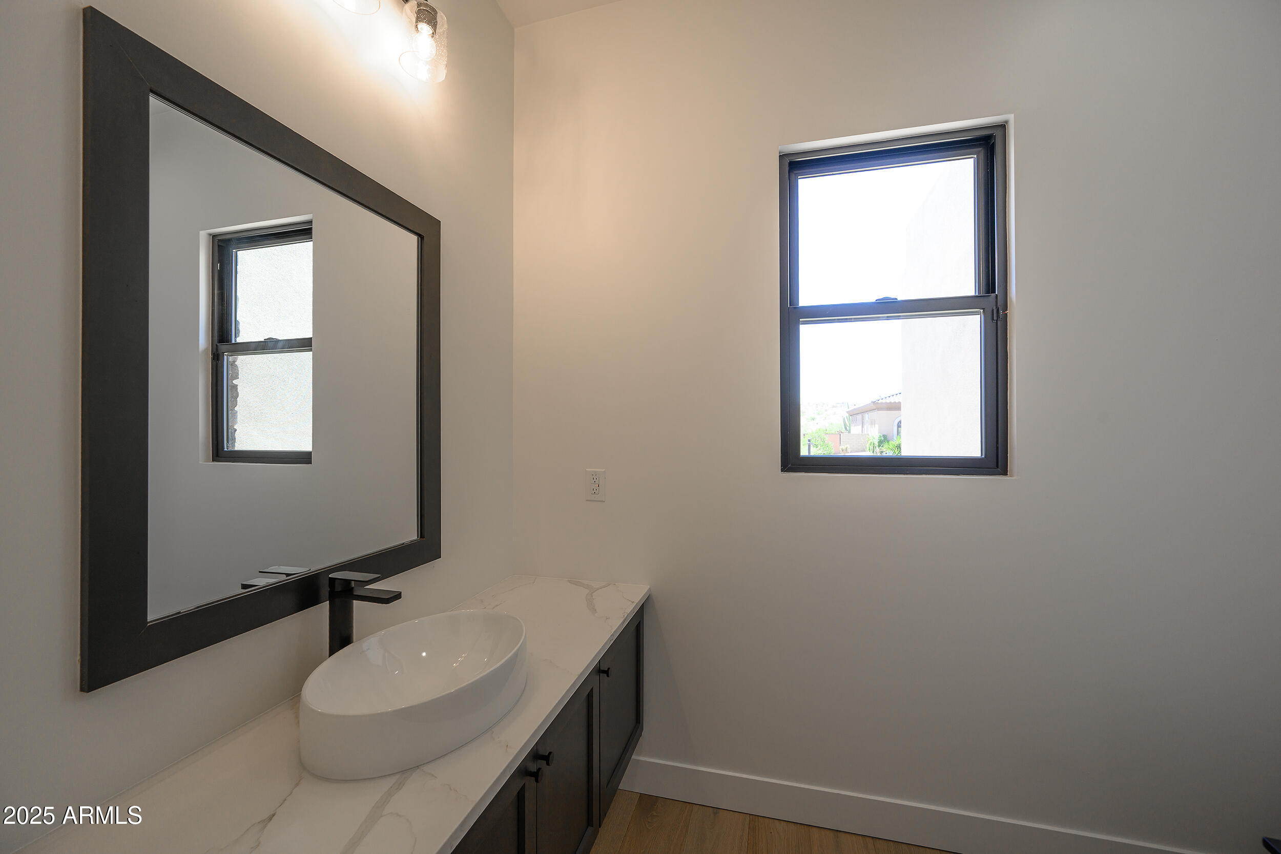 13290 East La Junta Road Scottsdale, AZ 85255 - Photo 12 of 15 a bathroom with a sink vanity and a mirror