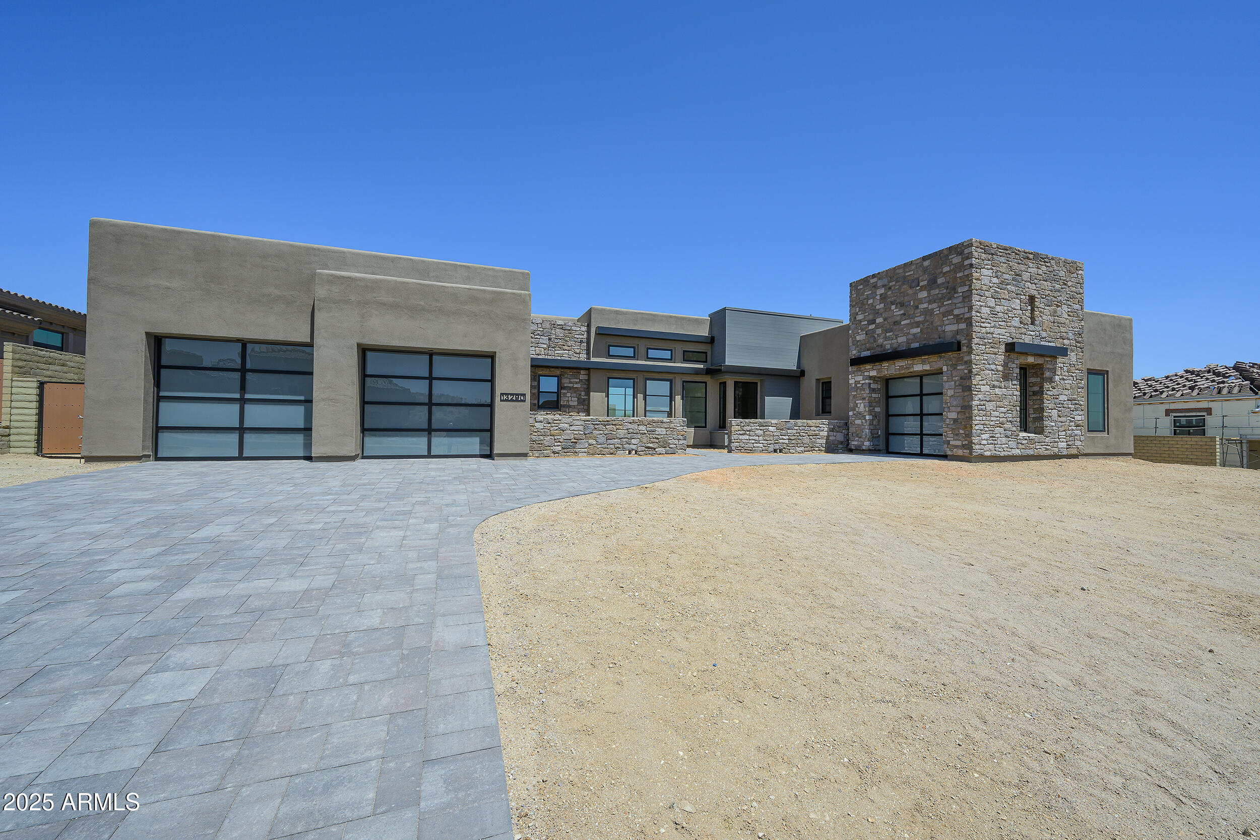 13290 East La Junta Road Scottsdale, AZ 85255 - Photo 2 of 15 a house with large outdoor space and a car parked in front of it