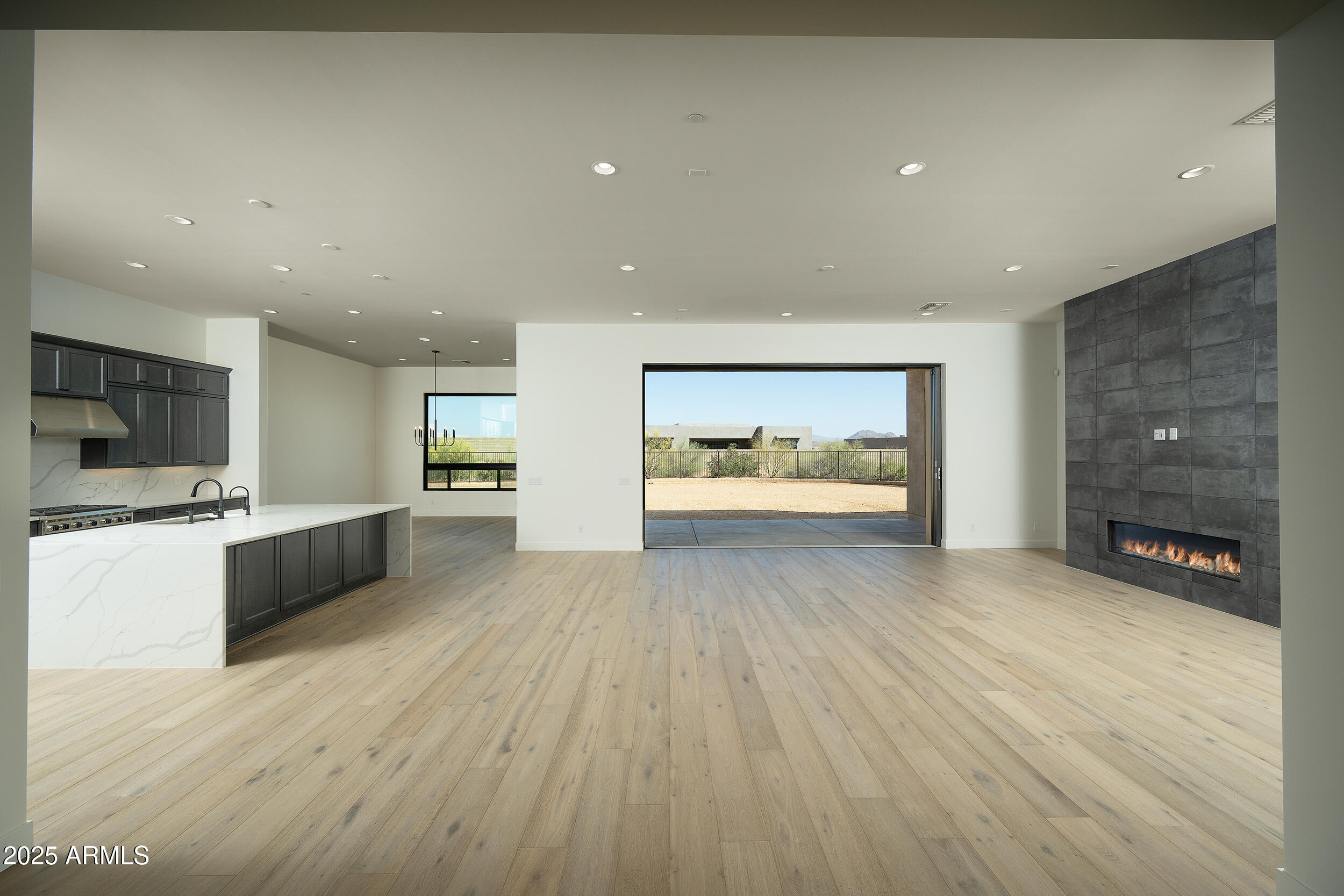 13290 East La Junta Road Scottsdale, AZ 85255 - Photo 4 of 15 a view of kitchen with furniture and wooden floor