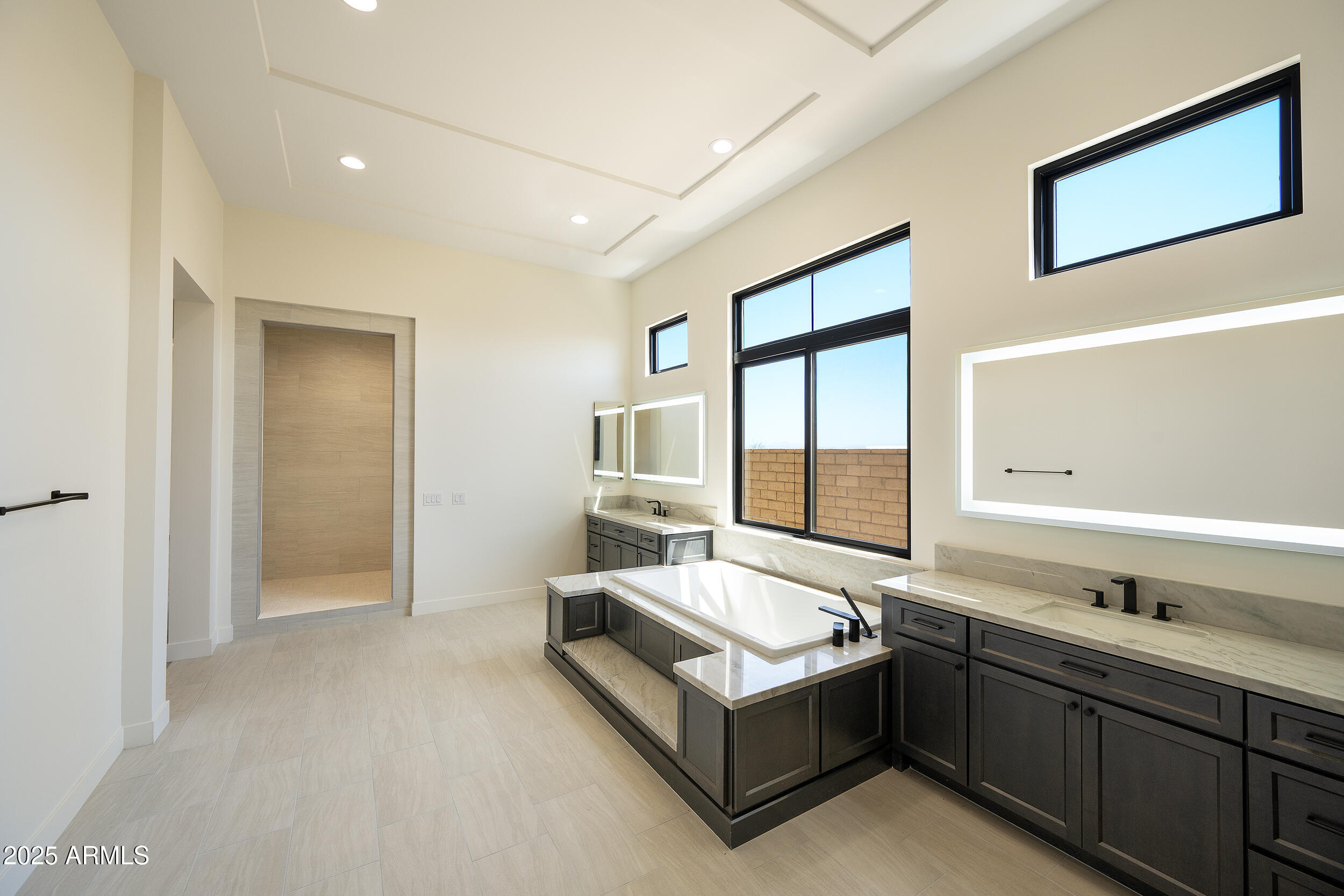 13290 East La Junta Road Scottsdale, AZ 85255 - Photo 10 of 15 a spacious bathroom with a double vanity sink and a bathtub