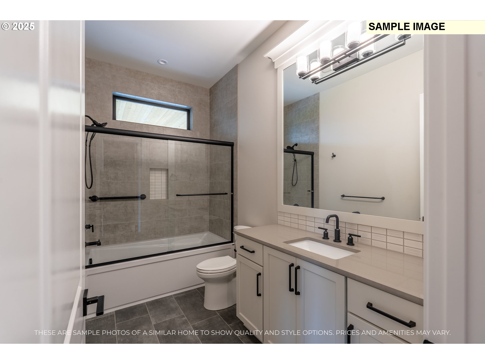 1618 North Paradise Avenue Ridgefield, WA 98642 - Photo 13 of 36 a bathroom with a sink mirror toilet and shower