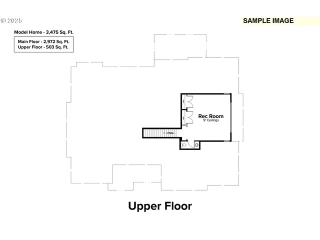 a picture of a room with a white wall and a refrigerator