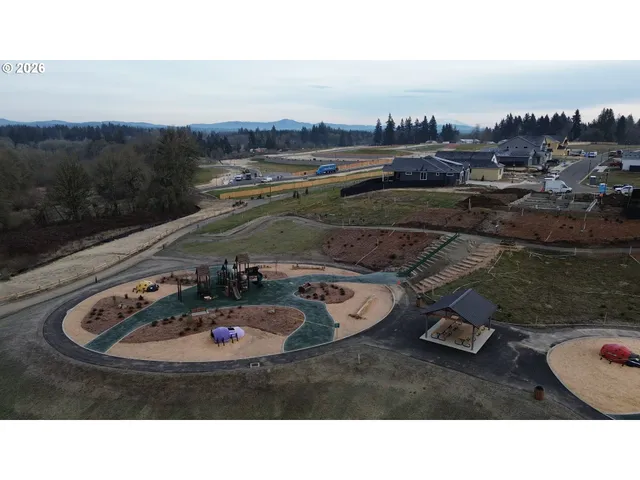 a view of a swimming pool with a yard